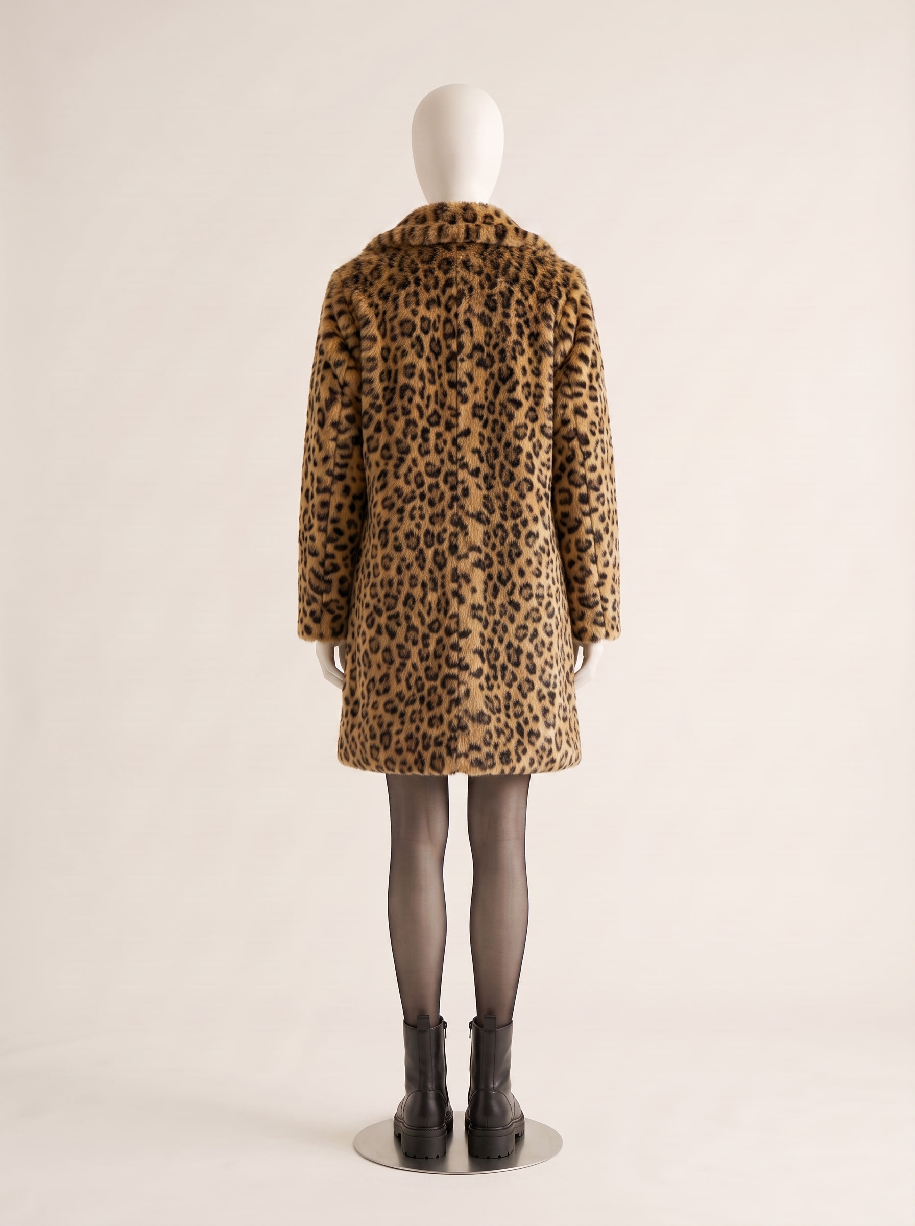Contessa, back view of a custom faux fur coat by Kroja