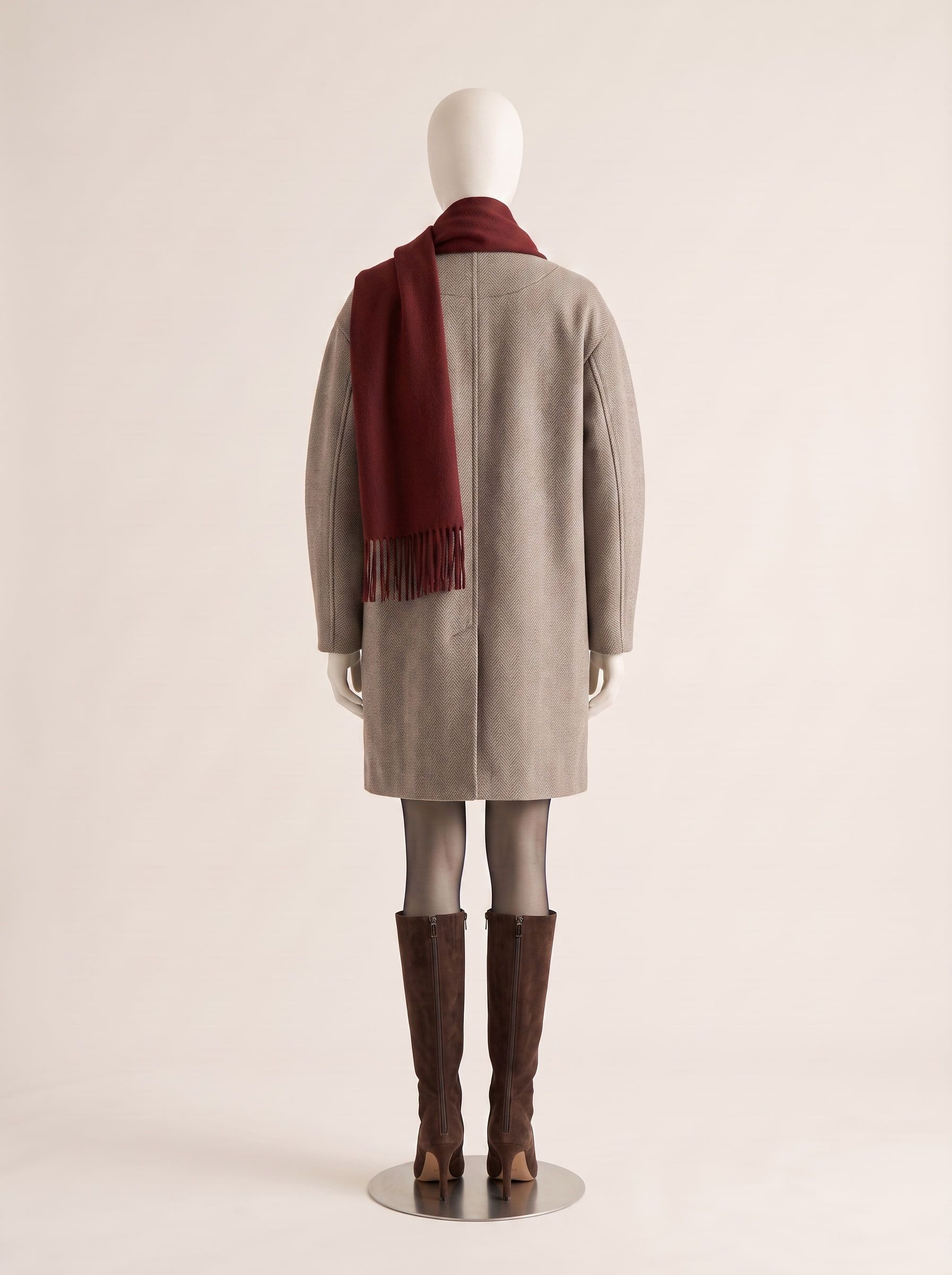 Ember, back view of a custom wool flannel coat by Kroja